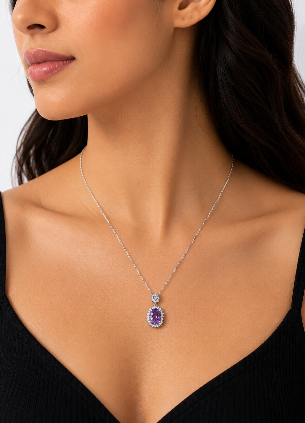 925 Sterling Silver Purple Halo Pendant Necklace with oval violet gemstone and sparkling cubic zirconia halo on a white background.
