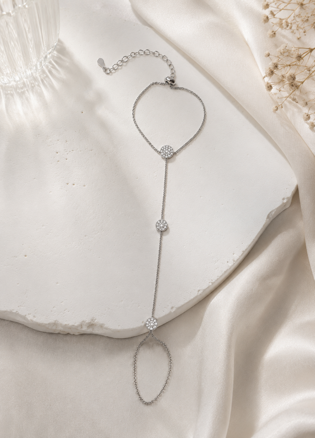 Silver crystal hand harness bracelet displayed on a neutral background for premium jewelry presentation.