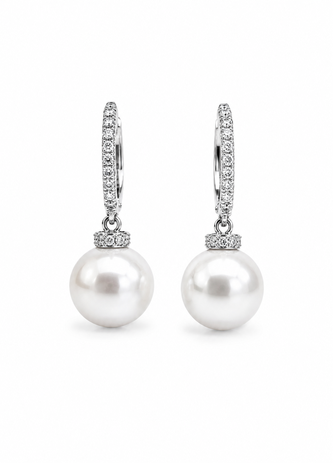 Silver pearl drop hoop earrings with Cubic Zirconia isolated on white background for Shopify listing.