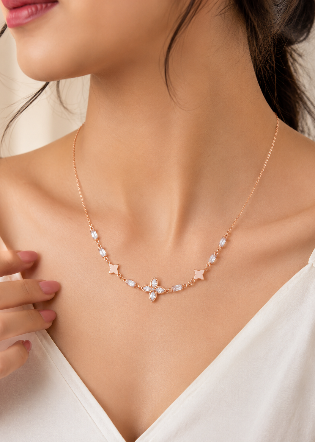 ORELVA Floral Crystal Rose Gold Necklace featuring a sparkling flower centerpiece