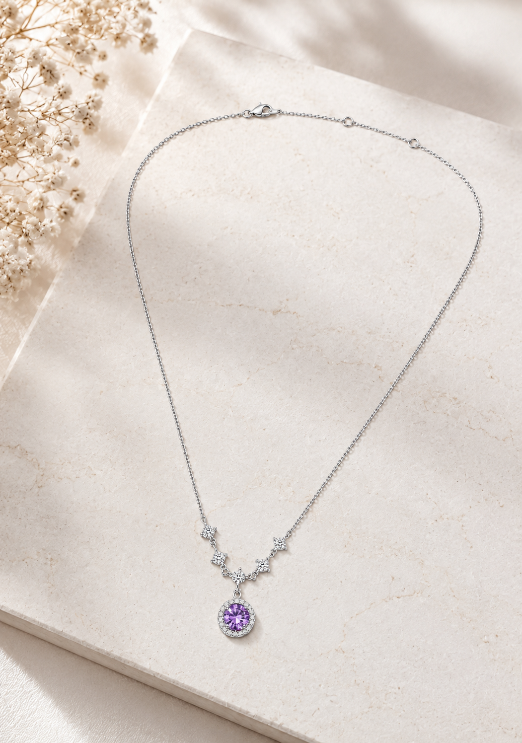 Close-up of ORELVA sterling silver purple halo pendant necklace for women