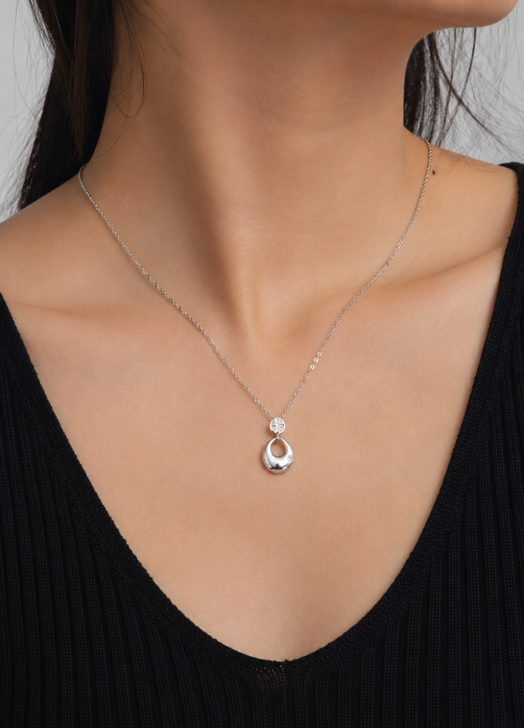 Orelva 925 sterling silver halo circle pendant necklace with cubic zirconia accent