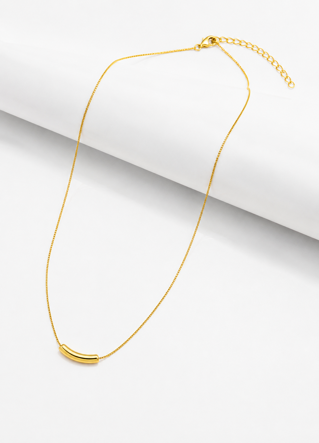 Minimalist gold plated curved bar necklace crafted from 925 sterling silver