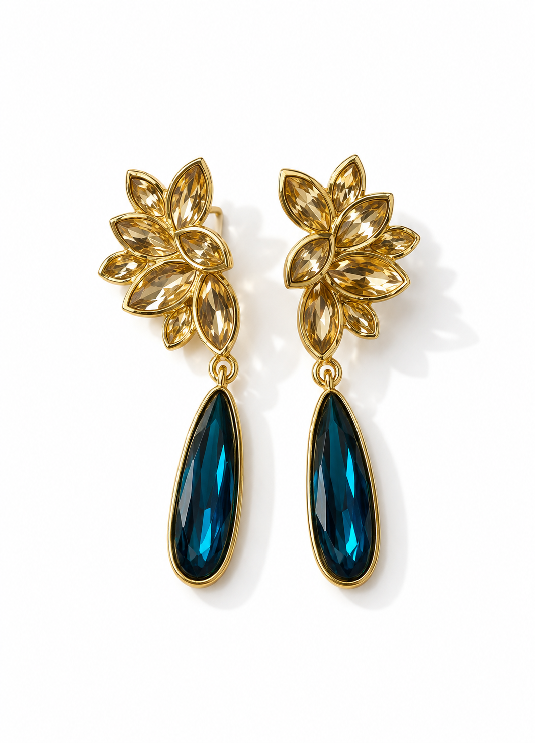 Front view of ORELVA Midnight Bloom gold-plated floral earrings with midnight blue crystal drops.