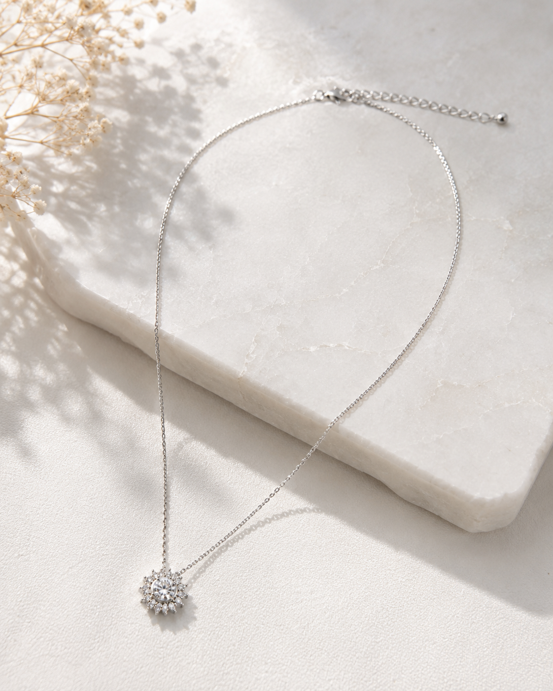 Elegant ORELVA silver crystal pendant necklace with adjustable chain.