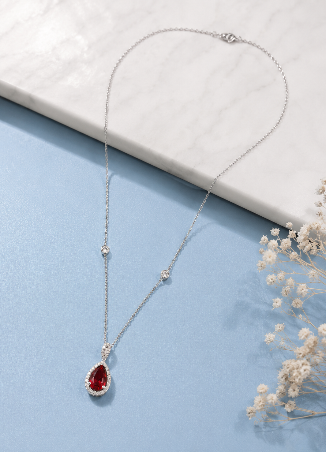 Luxury ruby teardrop pendant necklace crafted in genuine 925 sterling silver for women.